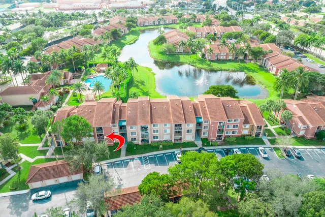 an aerial view of garden and swimming pool