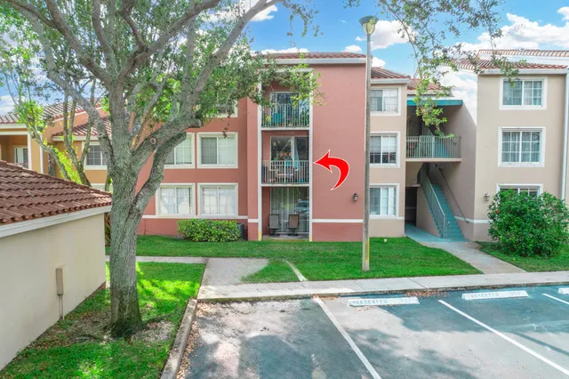 a view of small yard with plants