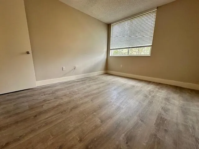 a view of a lake with a big yard