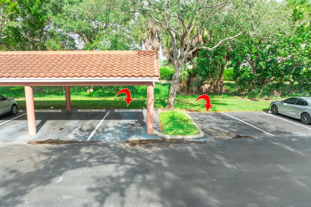 a kitchen with stainless steel appliances kitchen island granite countertop a refrigerator stove and oven