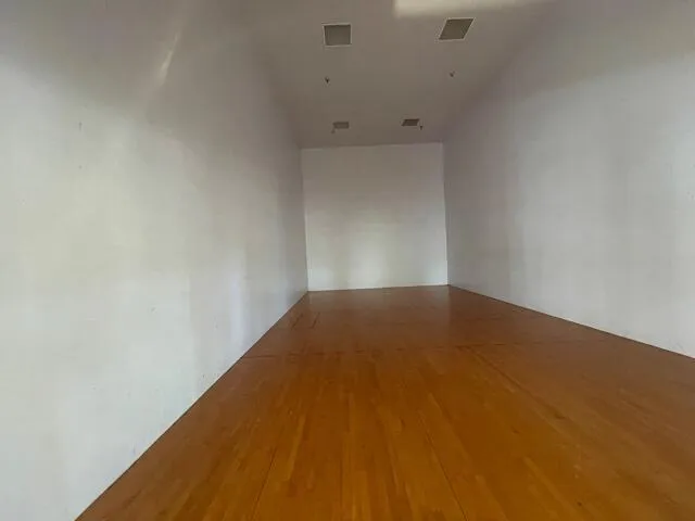 a view of a swimming pool with a yard