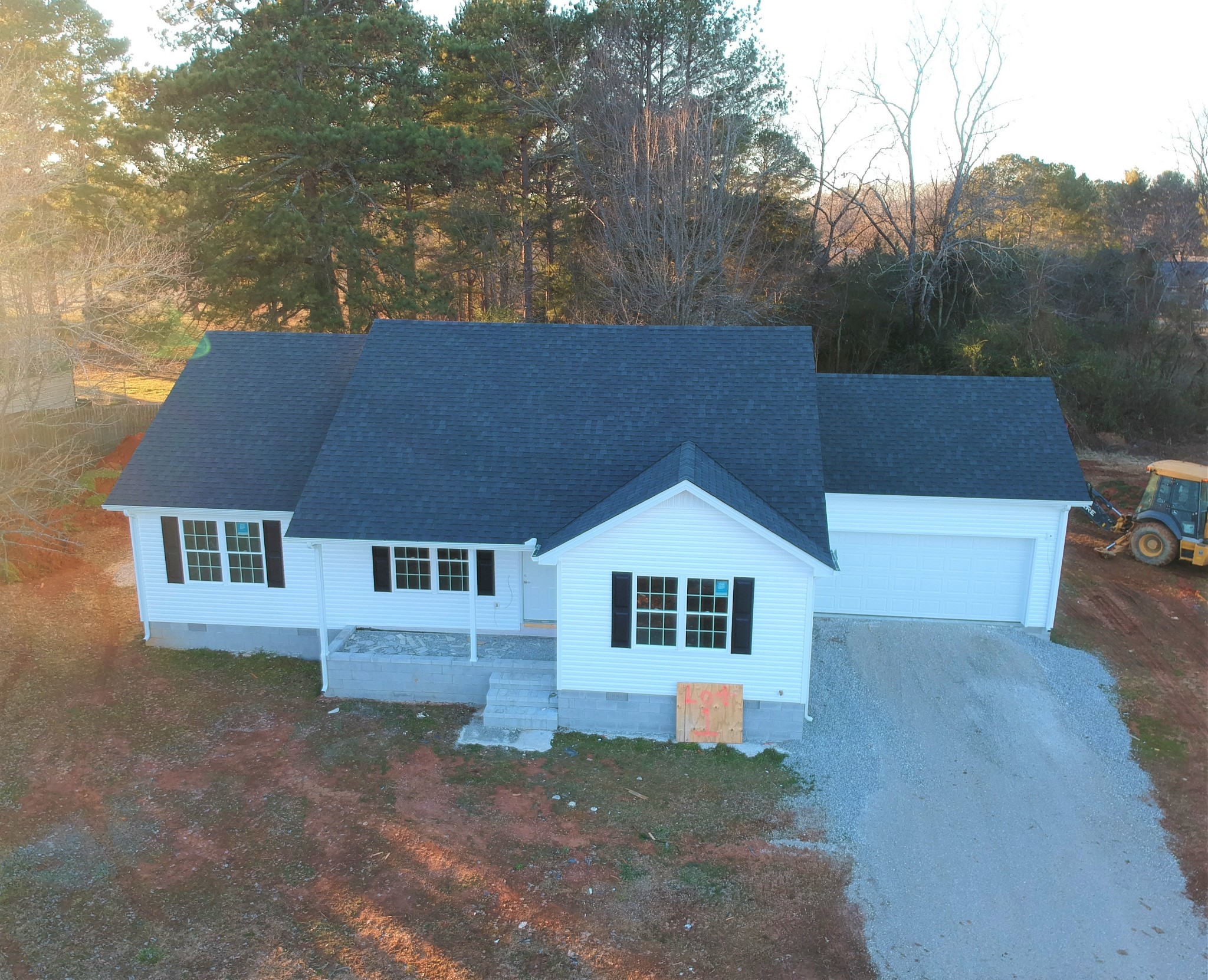 6111 Aedc Road Estill Springs, TN 37330 - Photo 3 of 24 a front view of a house with a yard
