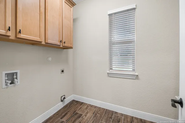 a view of a room that has a window