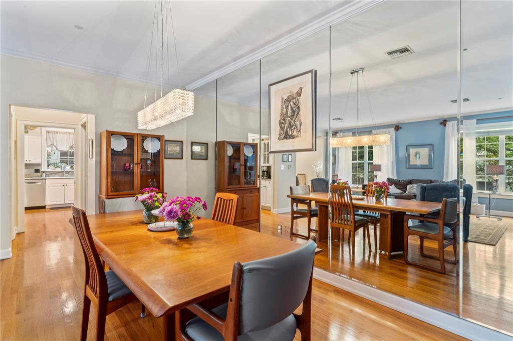 3011 West Mason Street, Unit B Tampa, FL 33629 - Photo 11 of 42 a dining room with wooden floor and large window