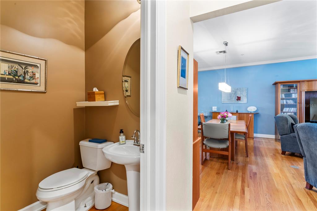 3011 West Mason Street, Unit B Tampa, FL 33629 - Photo 13 of 42 a bathroom with a toilet a sink and a mirror