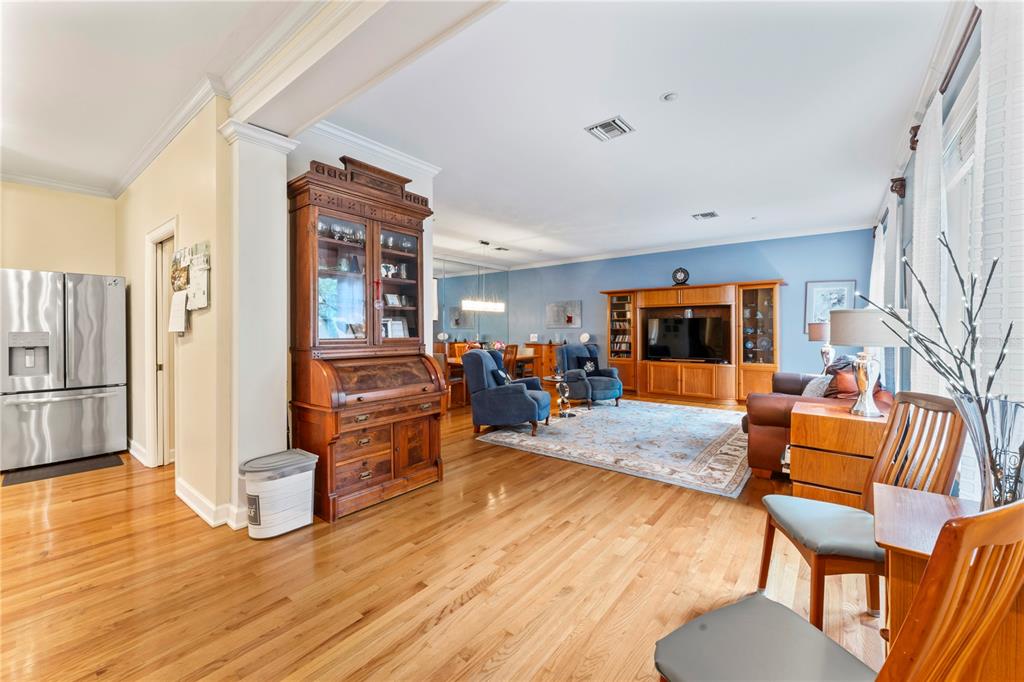 3011 West Mason Street, Unit B Tampa, FL 33629 - Photo 18 of 42 a living room with furniture and a wooden floor