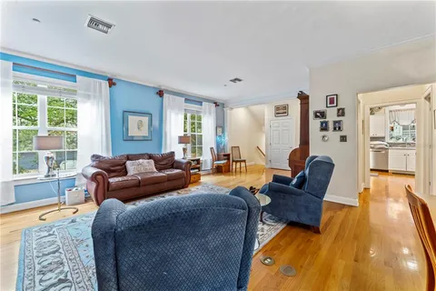 a living room with furniture and a table