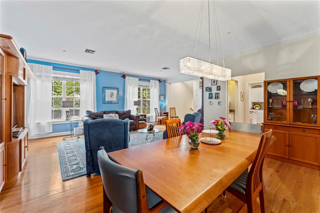 3011 West Mason Street, Unit B Tampa, FL 33629 - Photo 22 of 42 a view of a dining room with furniture and wooden floor