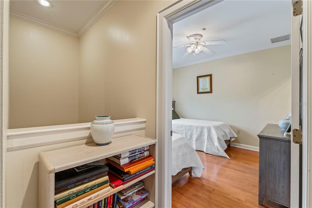 3011 West Mason Street, Unit B Tampa, FL 33629 - Photo 26 of 42 a bedroom with a bed and wooden floor