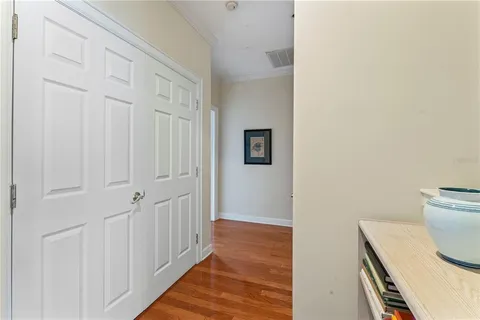 a view of a bathroom with wooden floor