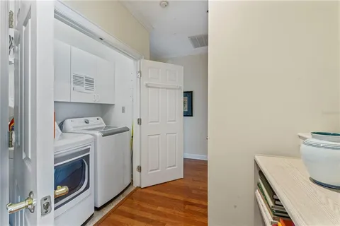 a view of storage and utility room with washer and dryer