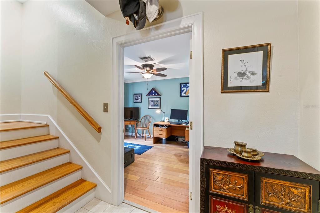 3011 West Mason Street, Unit B Tampa, FL 33629 - Photo 5 of 42 a view of a hallway with workspace and stairs