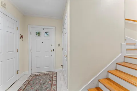 a view of room with wooden floor and closet