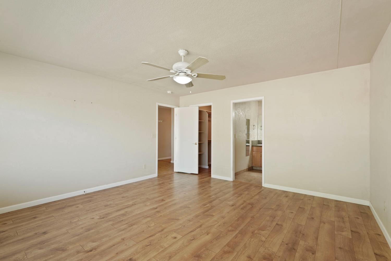 2636 West Turner Road Lodi, CA 95242 - Photo 12 of 24 a view of an empty room with a window
