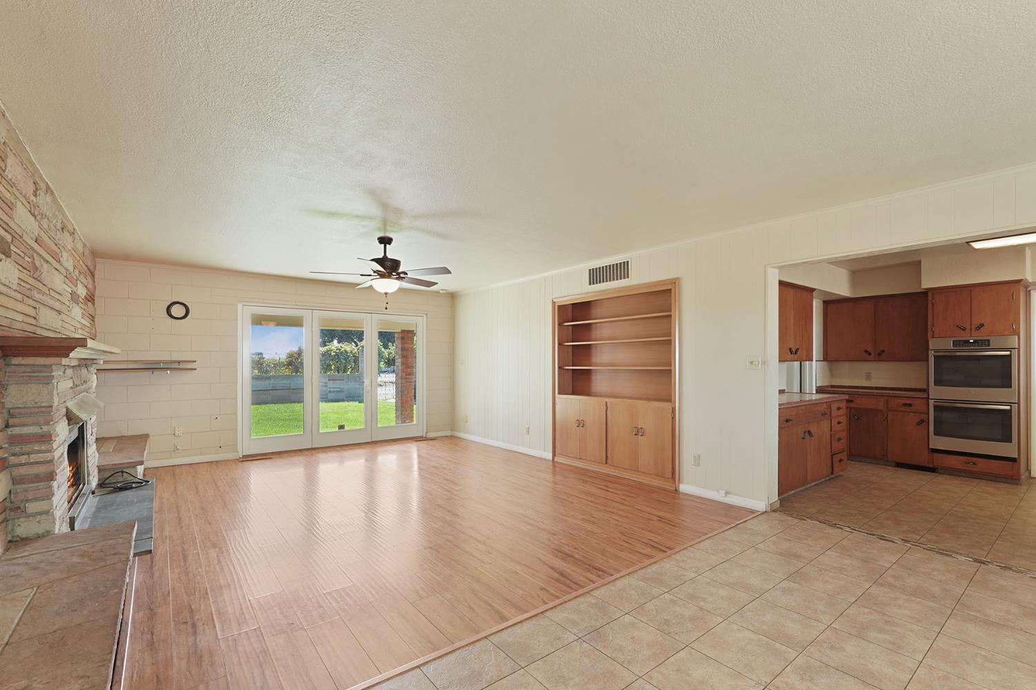 2636 West Turner Road Lodi, CA 95242 - Photo 6 of 24 an empty room with furniture and windows