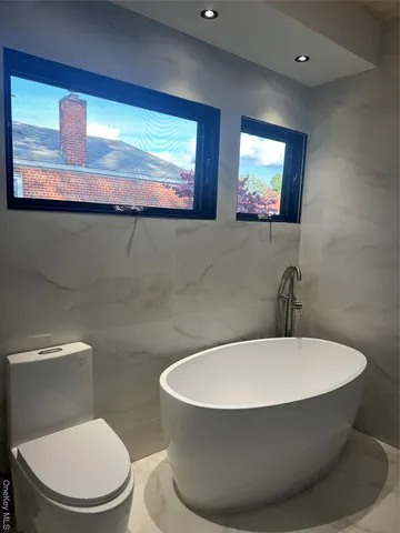 a bathroom with a toilet