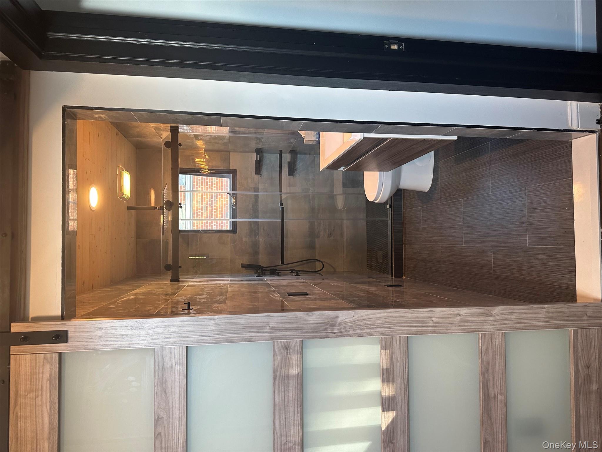 5918 Delafield Avenue Bronx, NY 10471 - Photo 21 of 31 a bathroom with a toilet