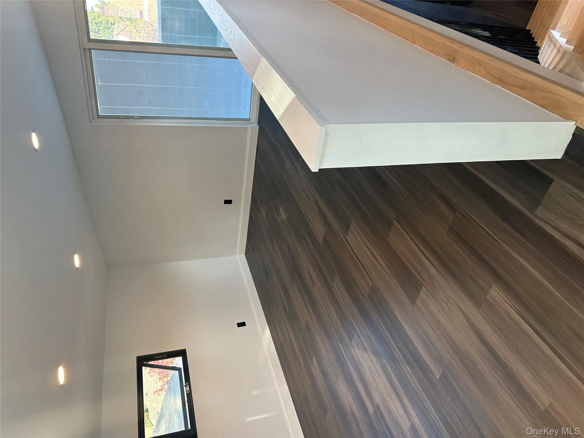 5918 Delafield Avenue Bronx, NY 10471 - Photo 24 of 31 a view of a hallway with wooden floor