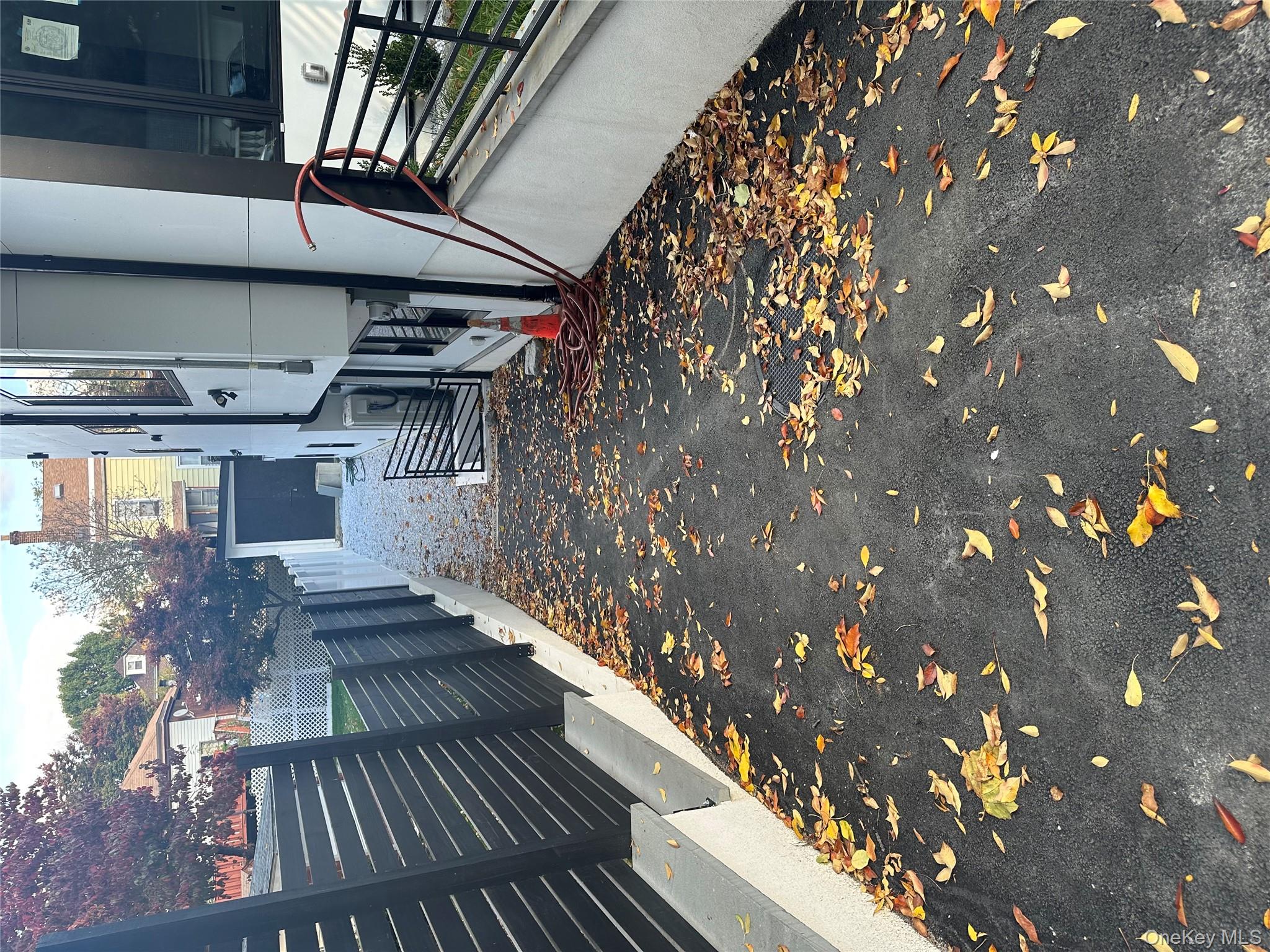 5918 Delafield Avenue Bronx, NY 10471 - Photo 29 of 31 a house view with a tree