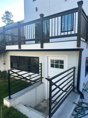 a kitchen with a sink cabinets and dining table