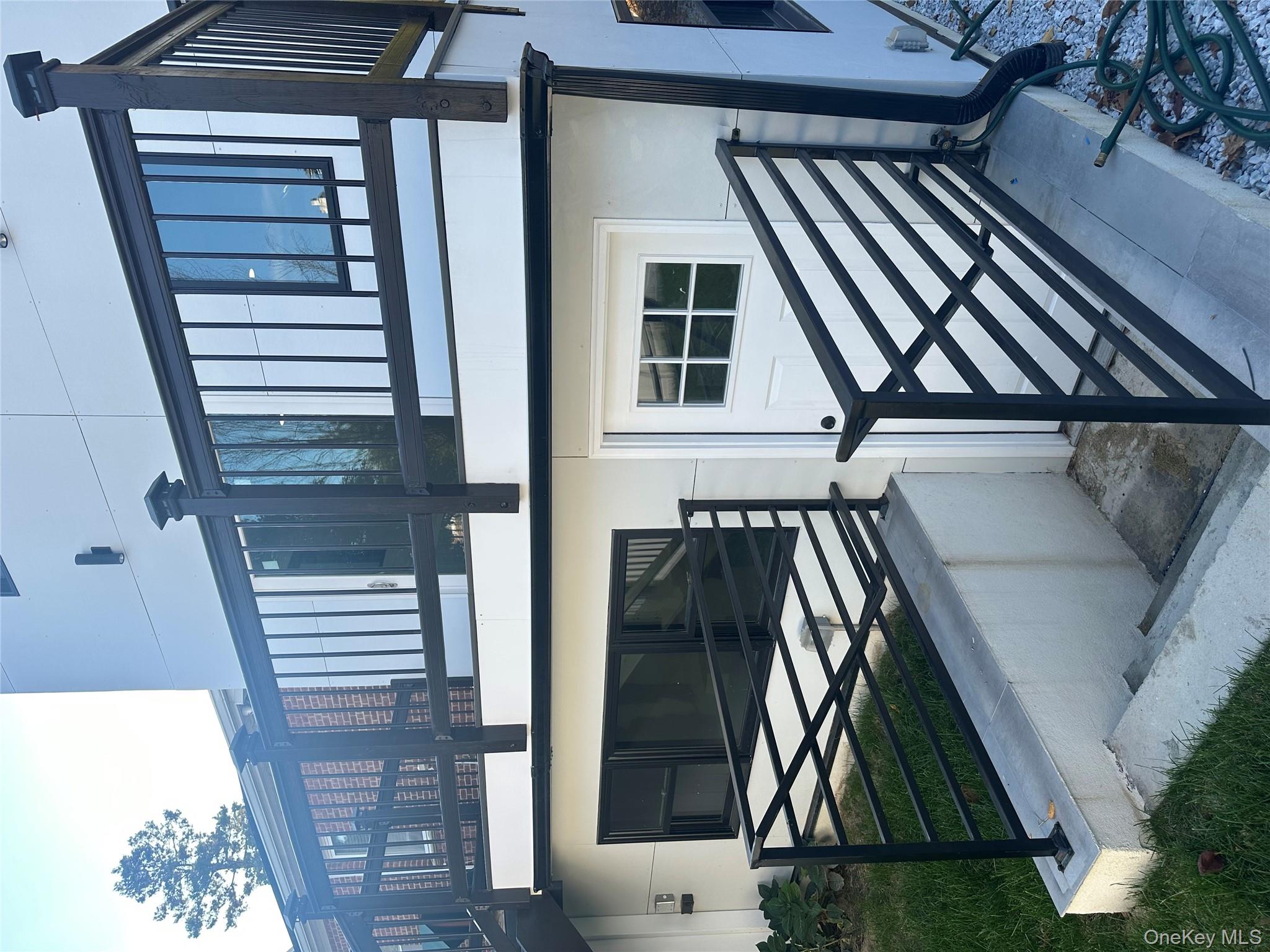 5918 Delafield Avenue Bronx, NY 10471 - Photo 6 of 31 a kitchen view of a fireplace