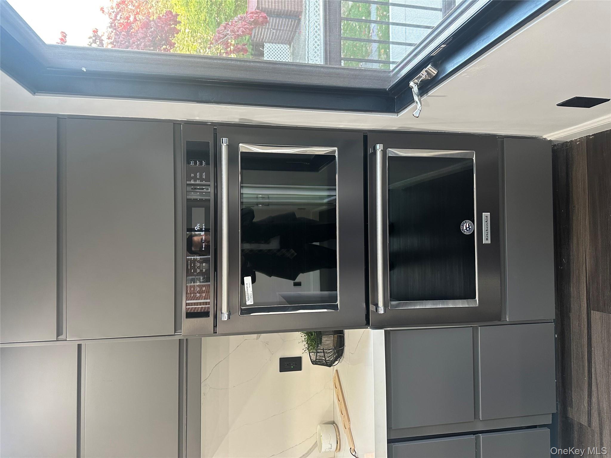 5918 Delafield Avenue Bronx, NY 10471 - Photo 9 of 31 a stove top oven sitting inside of a kitchen