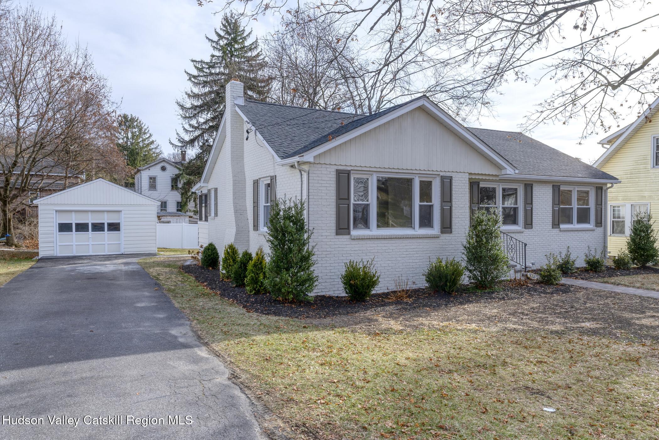 64 1st Avenue Kingston, NY 12401 - Photo 36 of 37 a view of a house with a yard and large trees