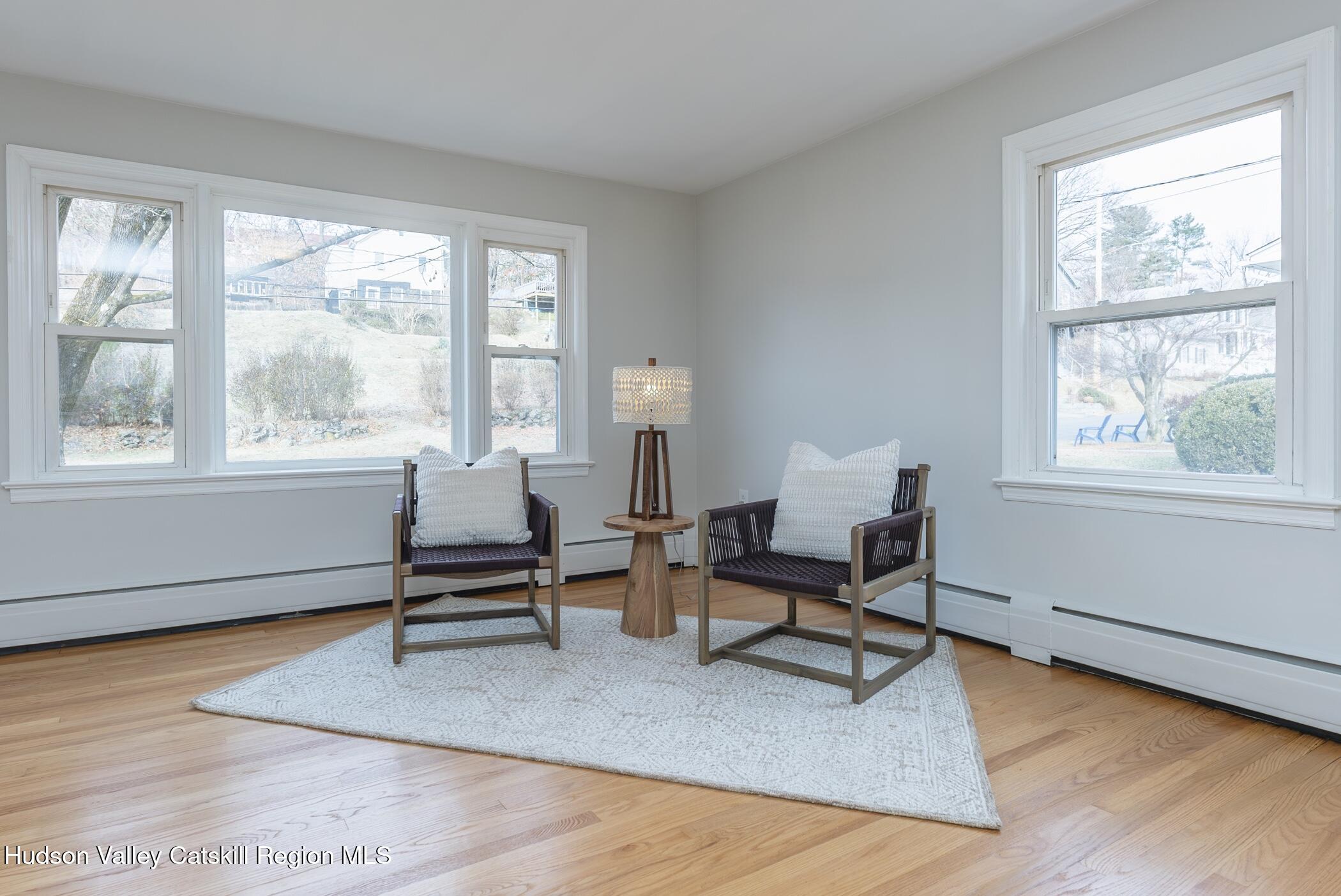 64 1st Avenue Kingston, NY 12401 - Photo 6 of 37 a living room with furniture and a window