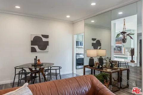 a bedroom with a bed and a table in it