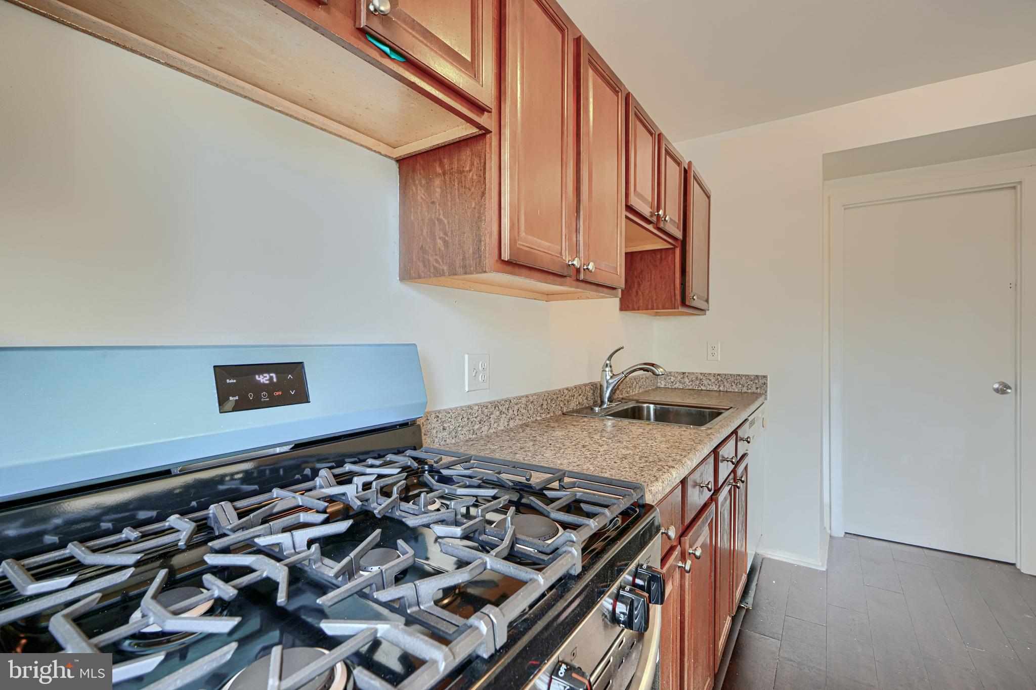 3 Slavin Court, Unit 2K Nottingham, MD 21236 - Photo 12 of 39 a kitchen with a stove and a sink