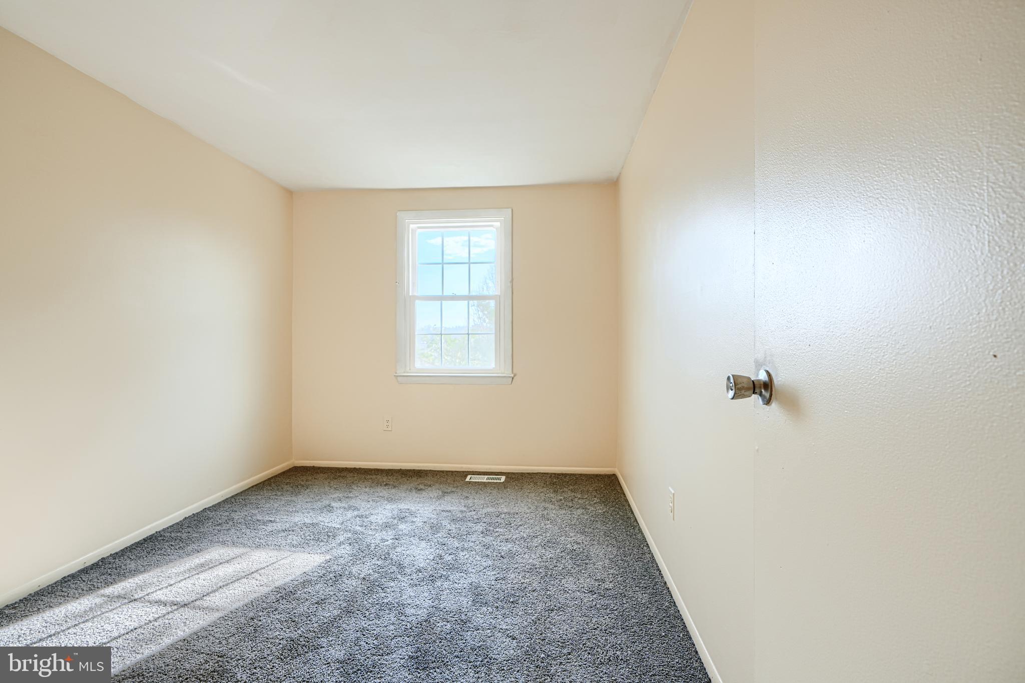 3 Slavin Court, Unit 2K Nottingham, MD 21236 - Photo 17 of 39 an empty room with windows