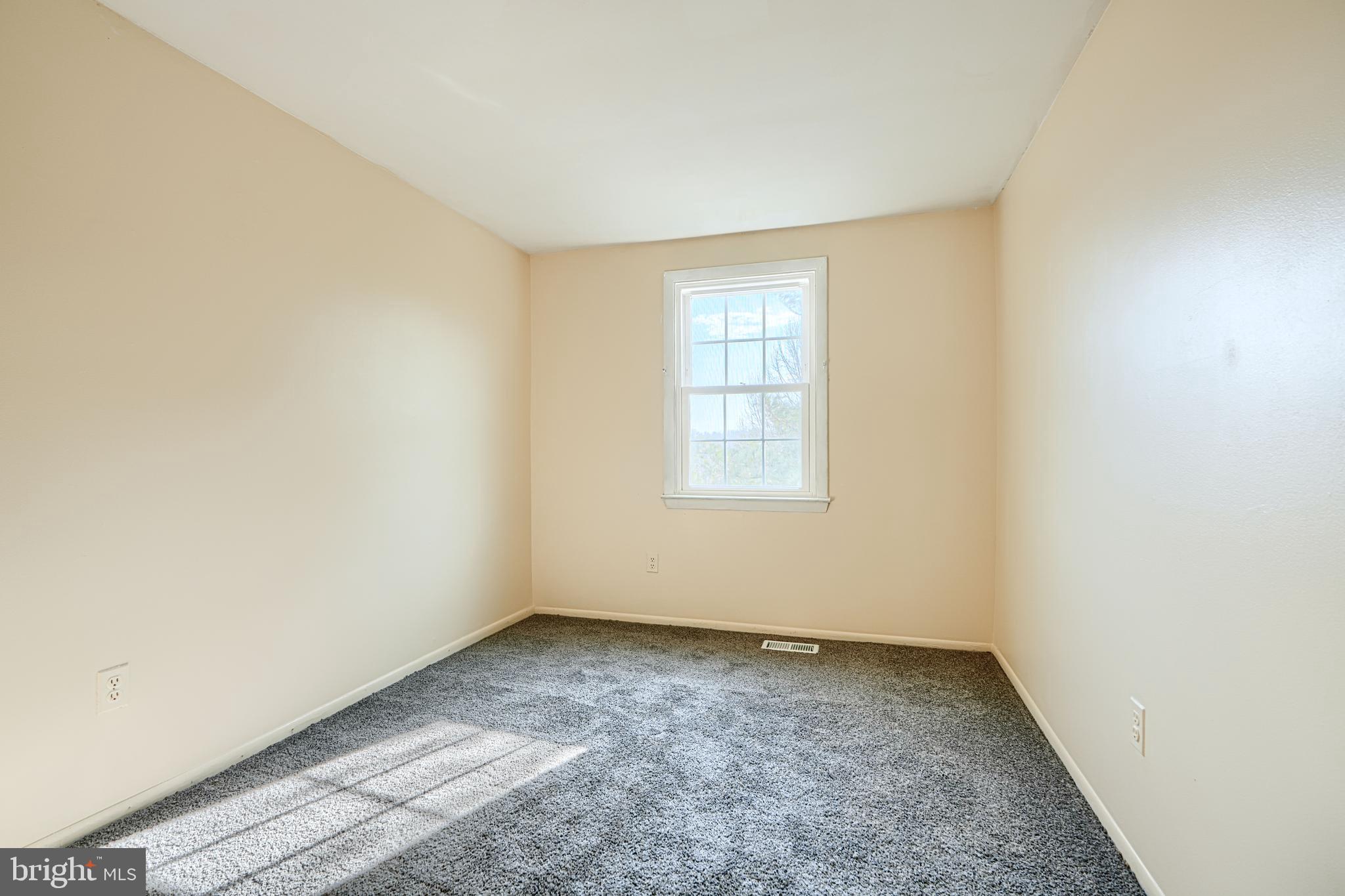 3 Slavin Court, Unit 2K Nottingham, MD 21236 - Photo 18 of 39 an empty room with windows