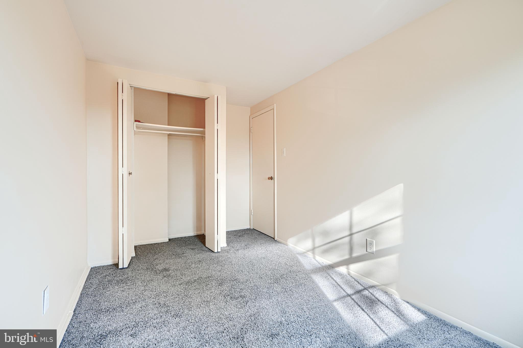 3 Slavin Court, Unit 2K Nottingham, MD 21236 - Photo 23 of 39 an empty room with windows