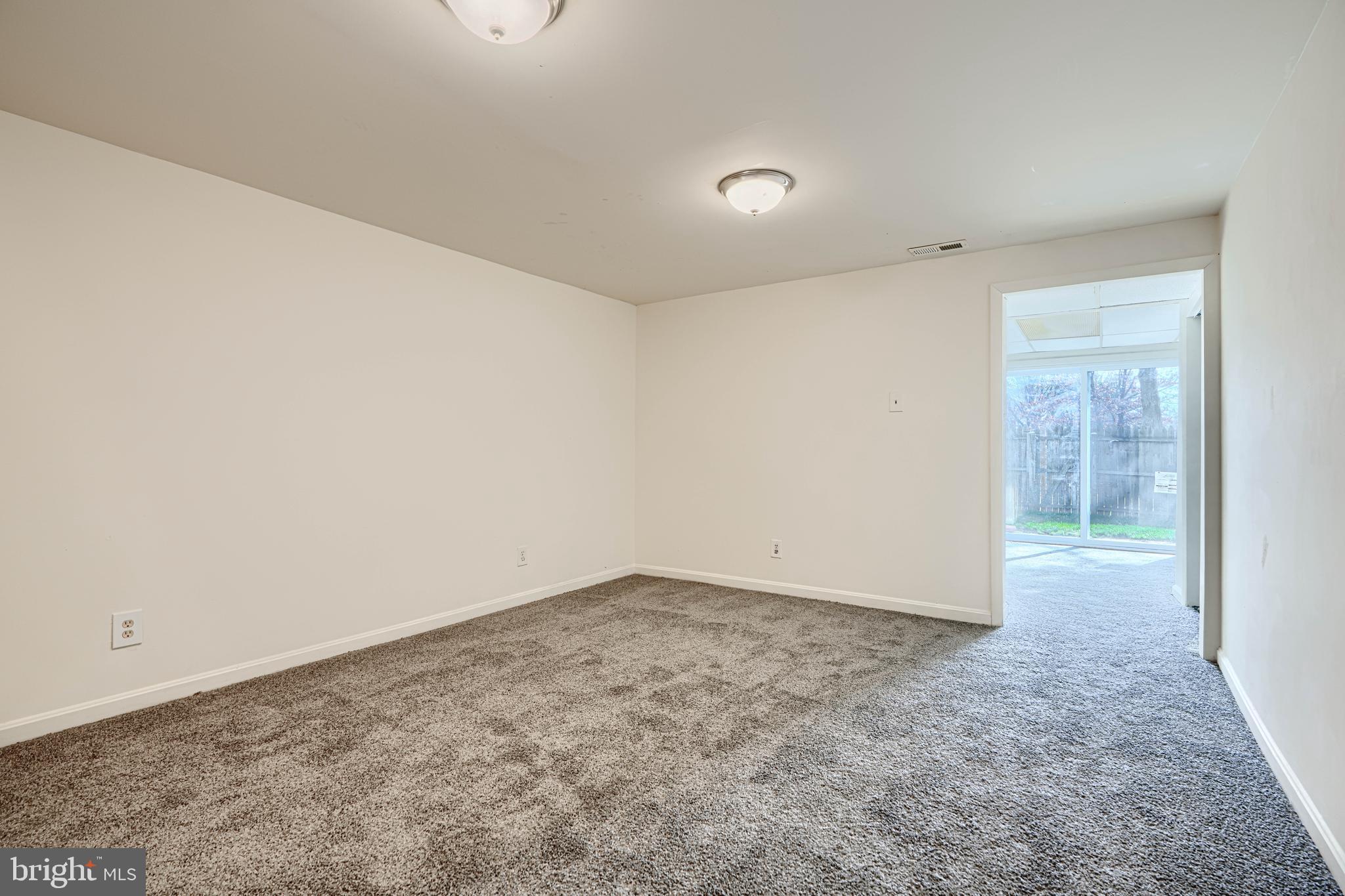 3 Slavin Court, Unit 2K Nottingham, MD 21236 - Photo 27 of 39 an empty room with windows