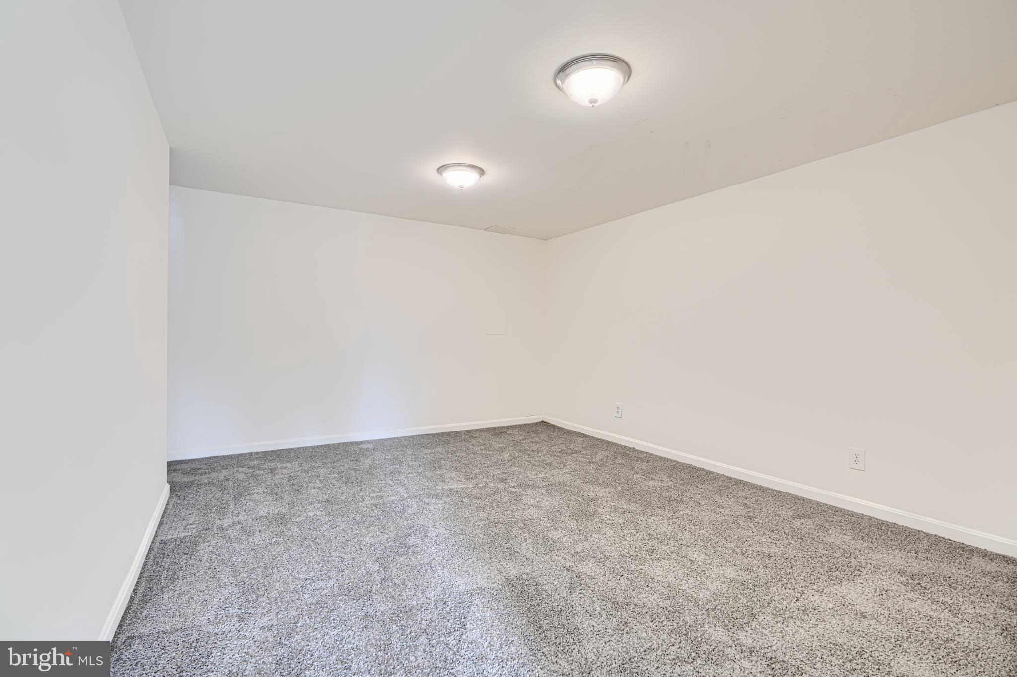 3 Slavin Court, Unit 2K Nottingham, MD 21236 - Photo 30 of 39 an empty room with an entryway