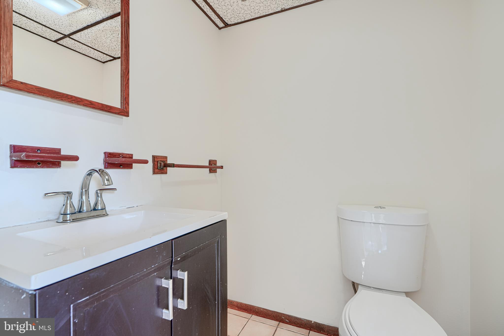 3 Slavin Court, Unit 2K Nottingham, MD 21236 - Photo 34 of 39 a bathroom with a sink and a toilet