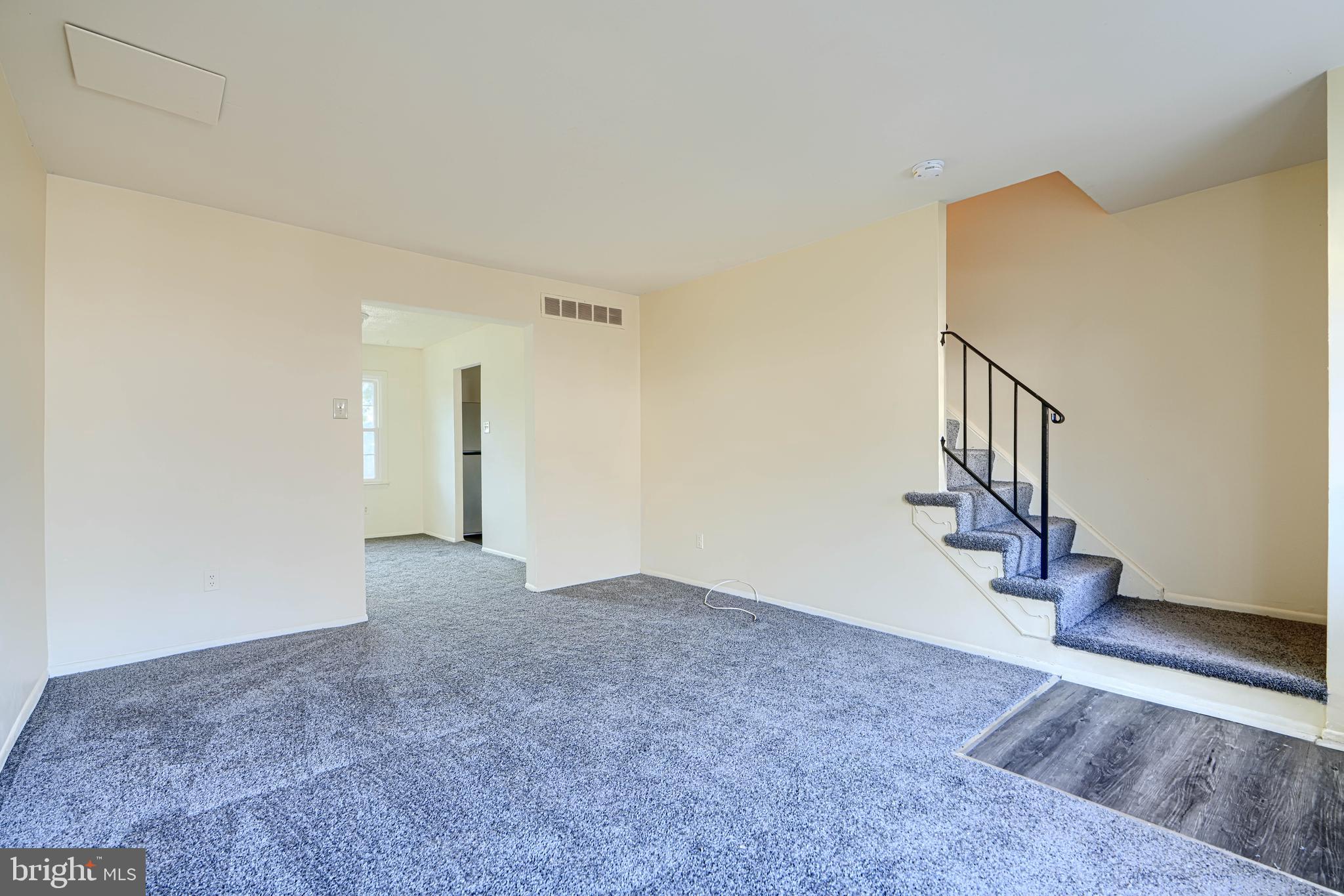 3 Slavin Court, Unit 2K Nottingham, MD 21236 - Photo 4 of 39 a view of an empty room with wooden floor