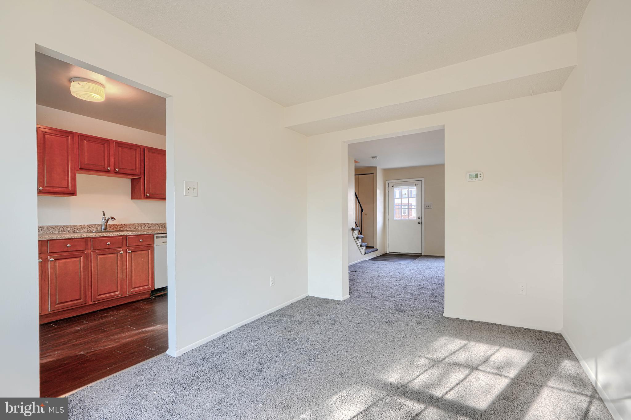3 Slavin Court, Unit 2K Nottingham, MD 21236 - Photo 8 of 39 a view of a bathroom sink and a mirror