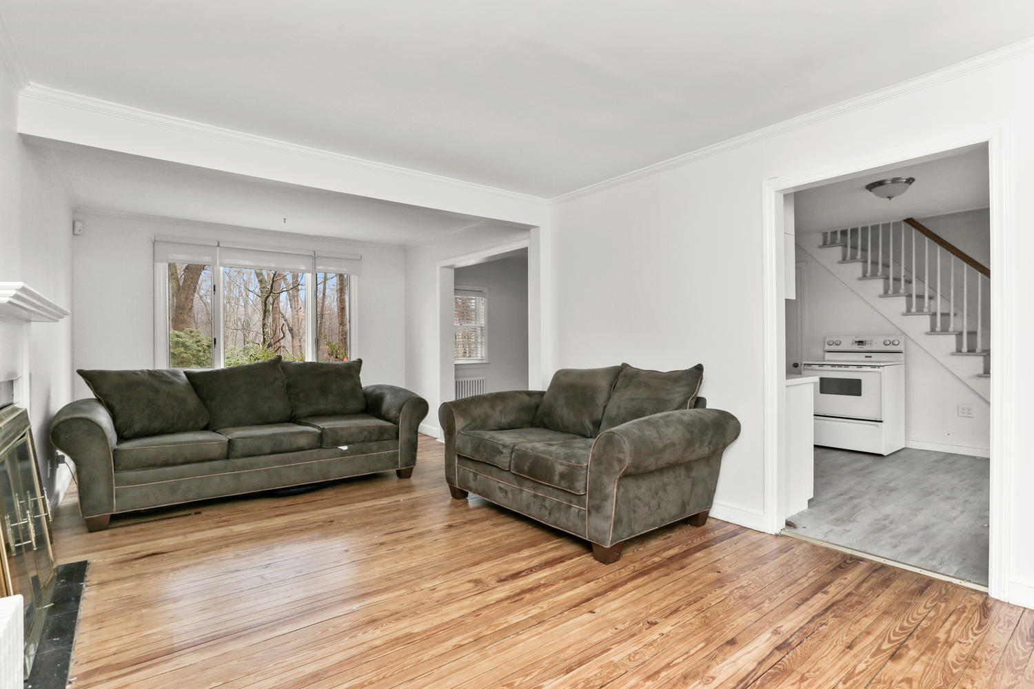 161 Spring Water Lane New Canaan, CT 06840 - Photo 4 of 9 a living room with furniture and a wooden floor