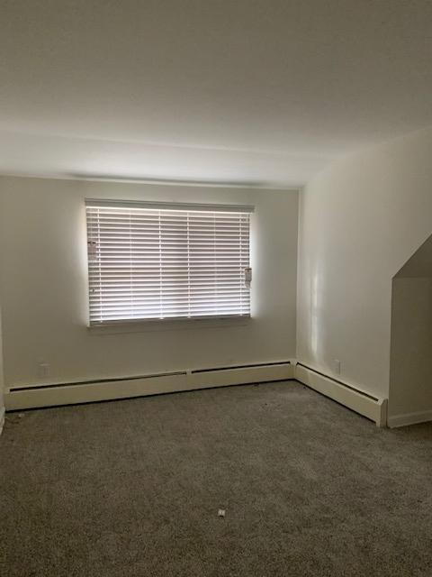 161 Spring Water Lane New Canaan, CT 06840 - Photo 8 of 9 an empty room with a empty space and windows