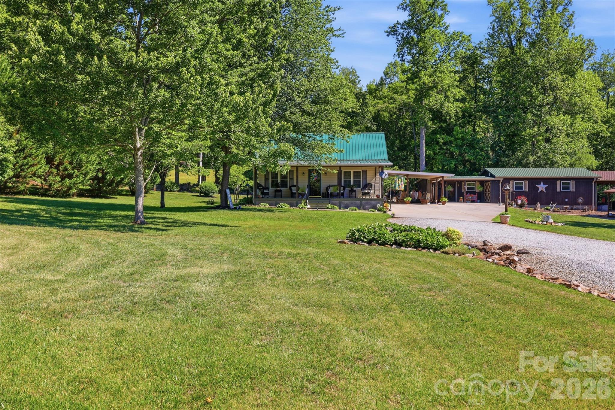 176-174 Oak Hollow Road Union Grove, NC 28689 - Photo 11 of 48 a view of a house with a big yard