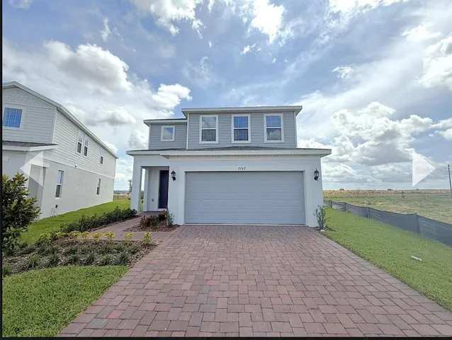 a front view of house with yard