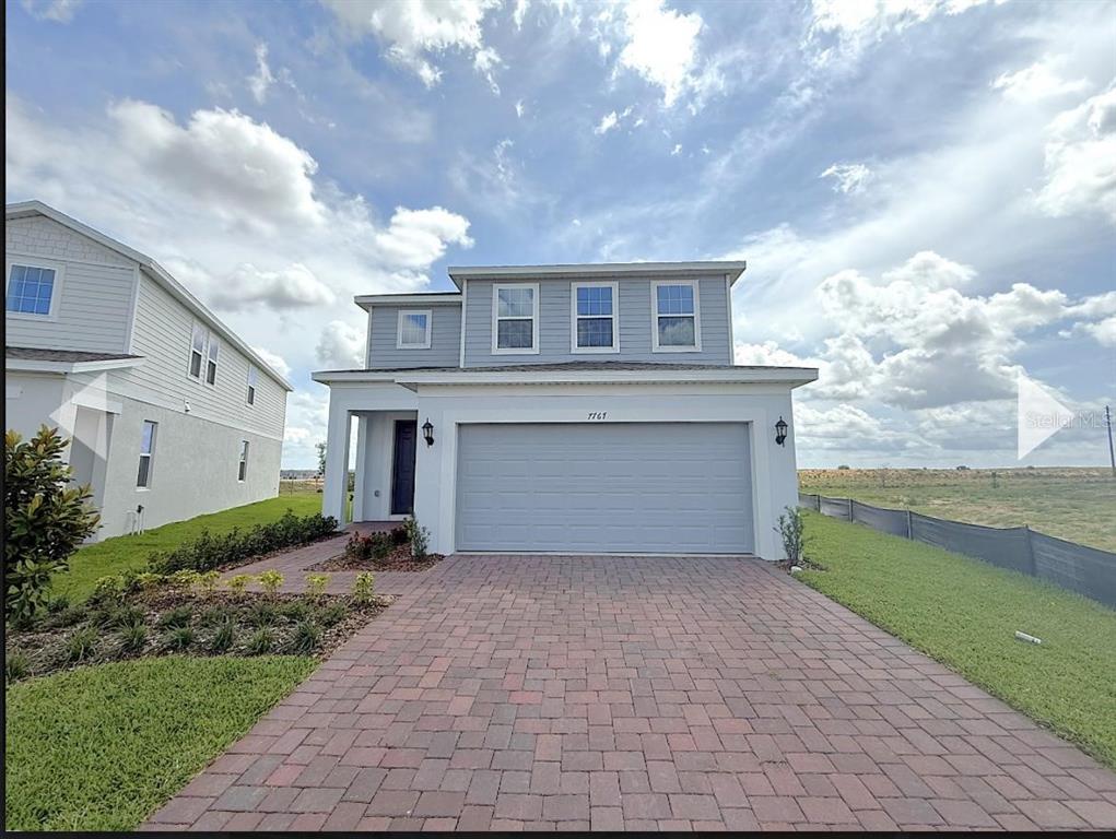 a front view of house with yard