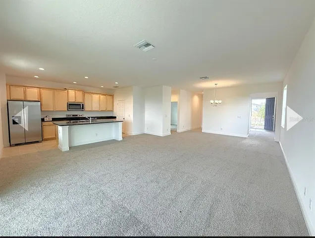 a view of a kitchen with a sink