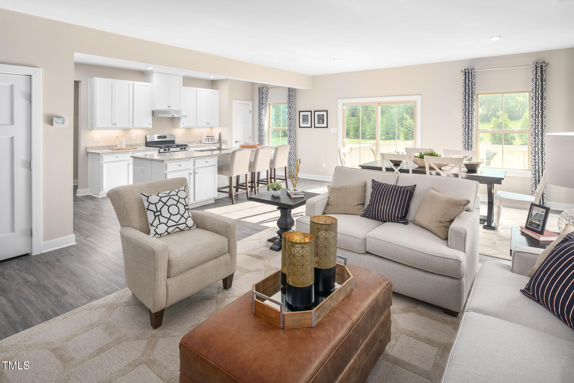812 Walker Rdg Way Willow Spring, NC 27592 - Photo 11 of 23 a living room with furniture and a large window