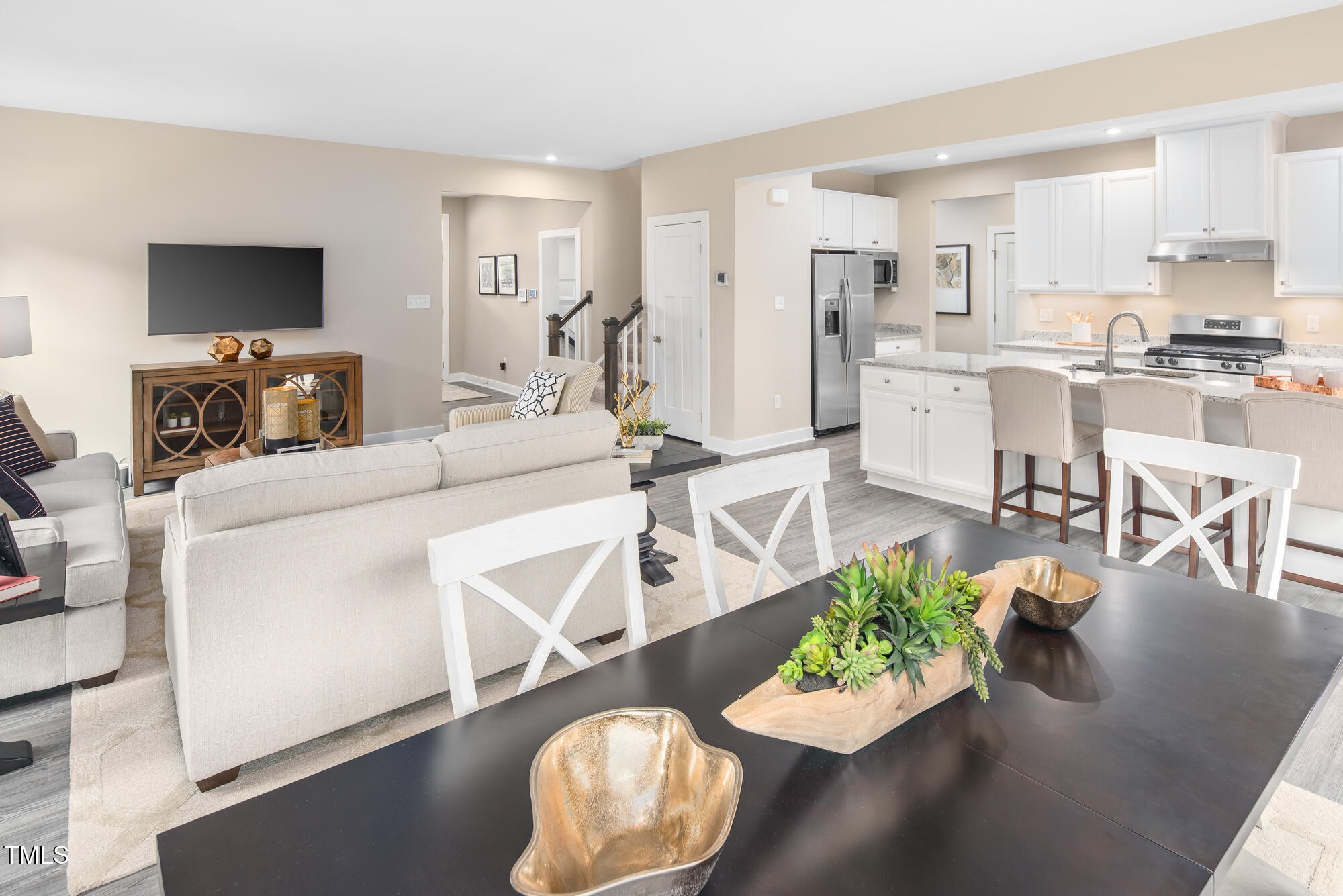 812 Walker Rdg Way Willow Spring, NC 27592 - Photo 7 of 23 a living room with furniture potted plant and kitchen view