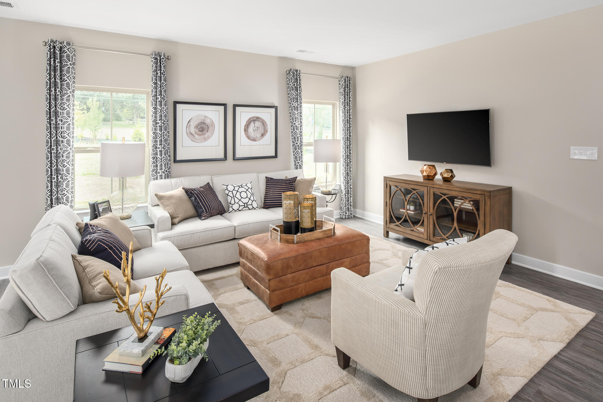 812 Walker Rdg Way Willow Spring, NC 27592 - Photo 9 of 23 a living room with furniture and a flat screen tv