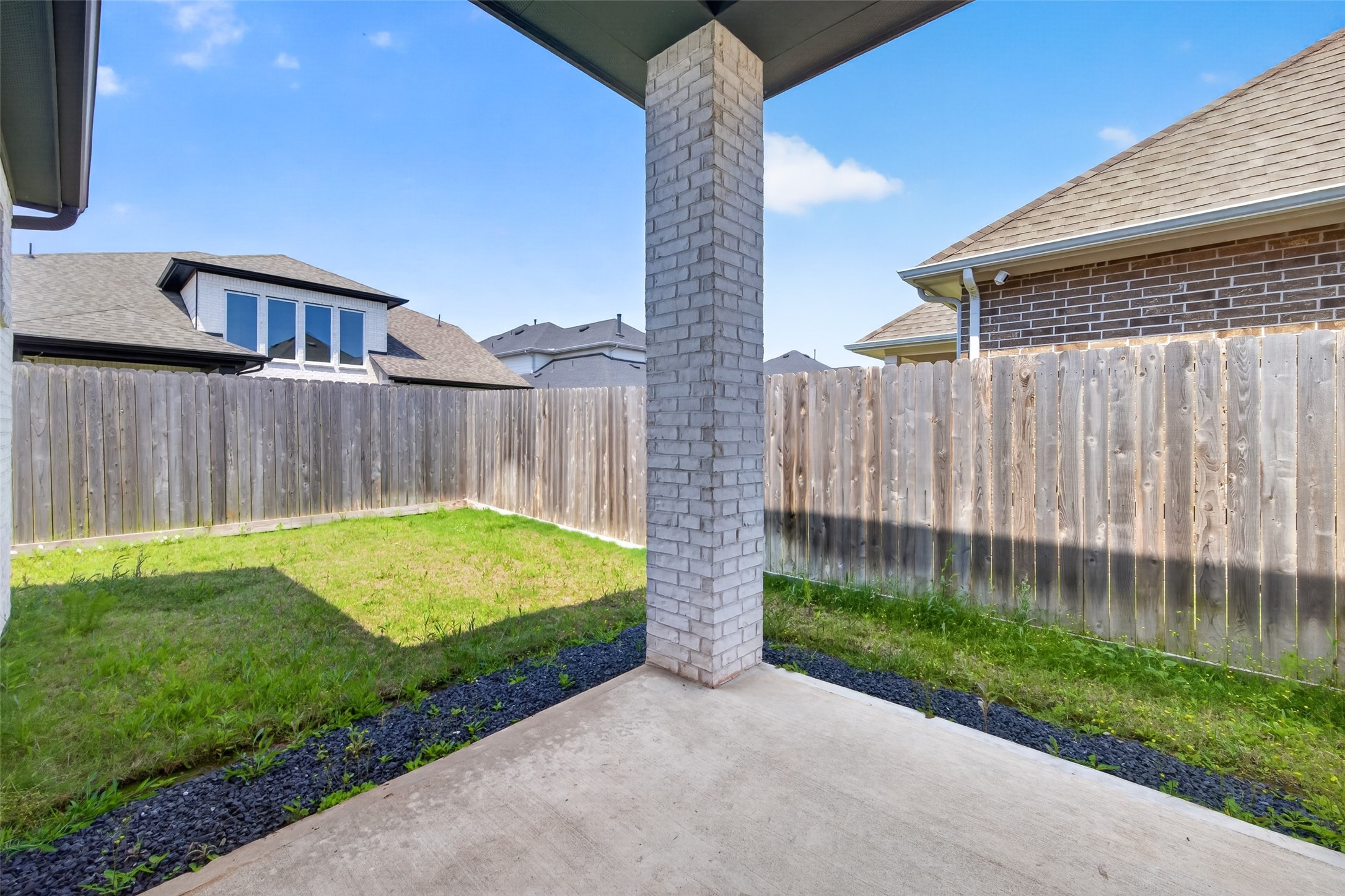 211 Amaranth Way Richmond, TX 77406 - Photo 26 of 26 a view of a backyard with grass