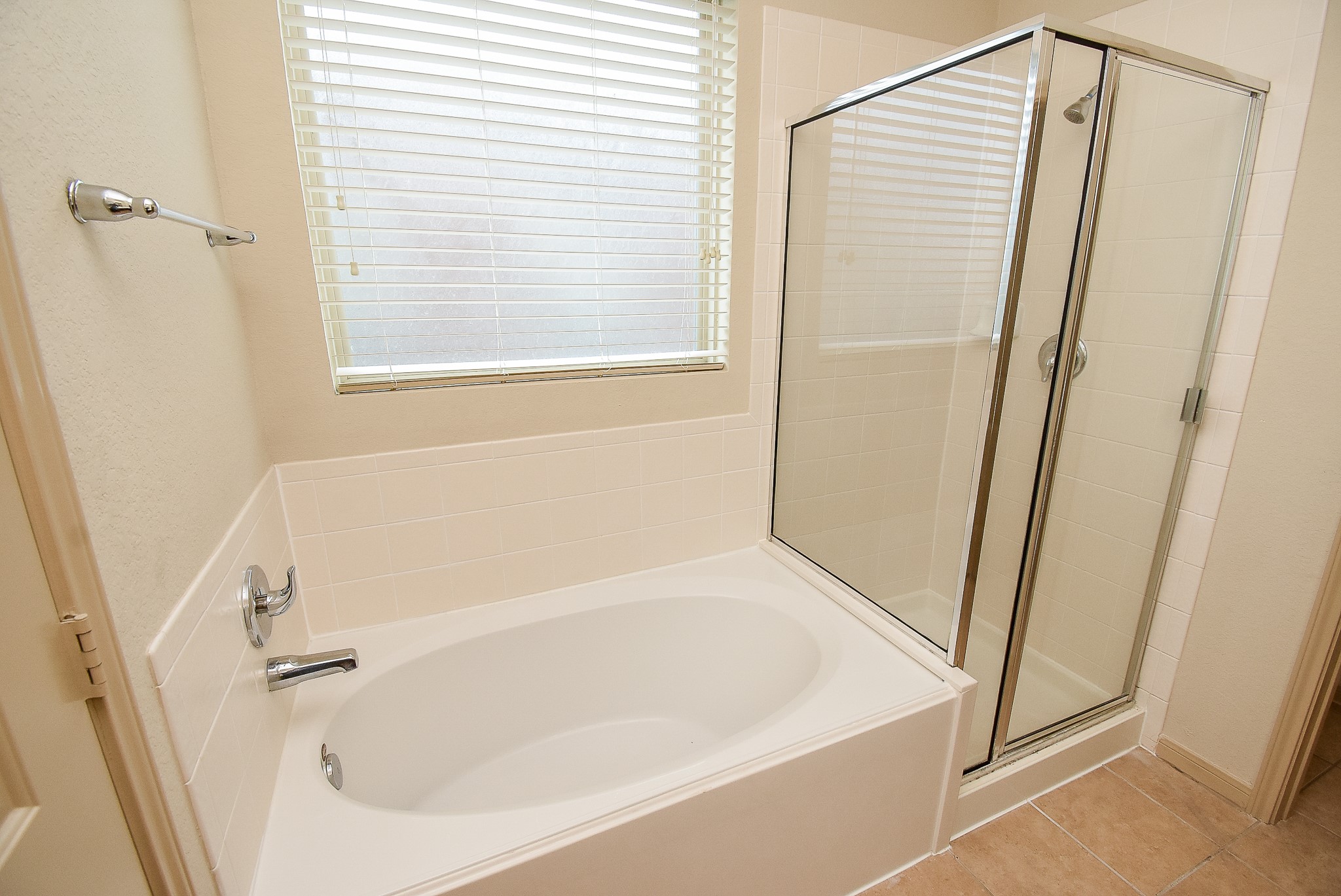 2106 Harmon Crest Court Spring, TX 77373 - Photo 18 of 32 a white bath tub and shower