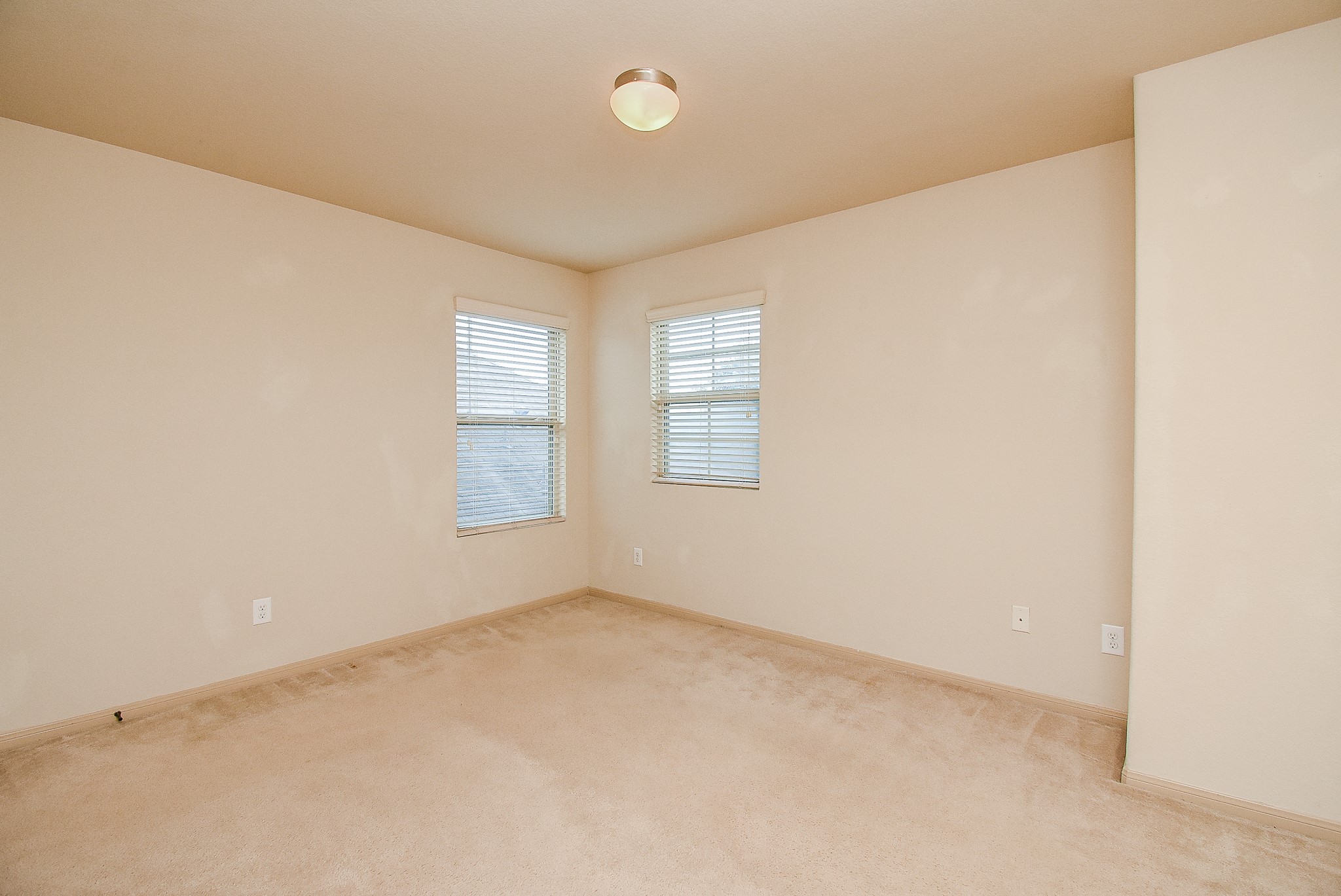 2106 Harmon Crest Court Spring, TX 77373 - Photo 21 of 32 an empty room with windows